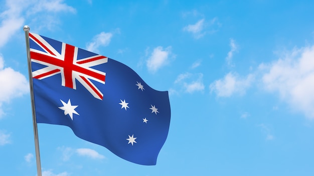 Australia flag on pole. Blue sky. National flag of Australia