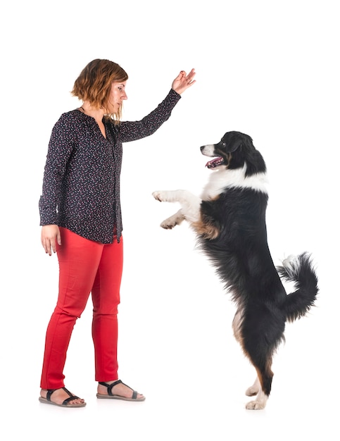 australian shepherd and woman