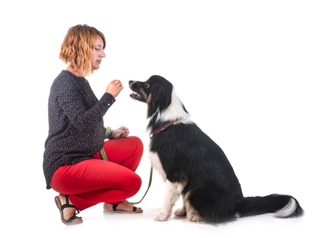 Australische herder en vrouw