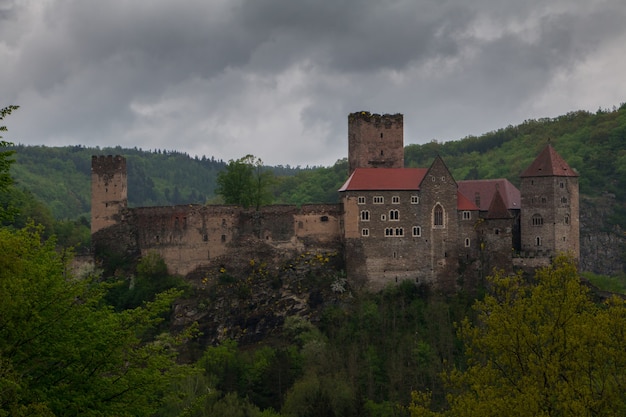 Austria. Ancient castle Riegersburg in the forested mountains in the rain