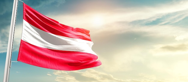 Austria waving flag in beautiful sky.