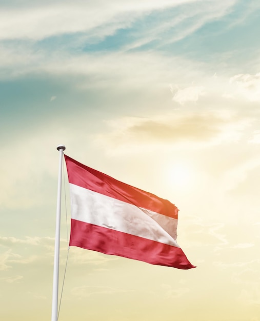 Austria waving flag in beautiful sky.