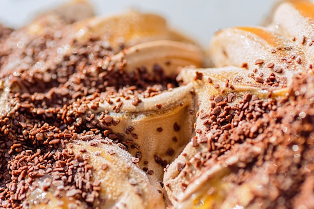 Austrian dessert, chocolate ice cream, close-up. Chocolate chips, apricot filling.