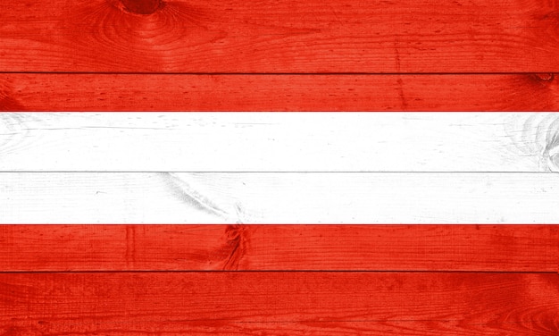 The Austrian flag painted on wooden fence