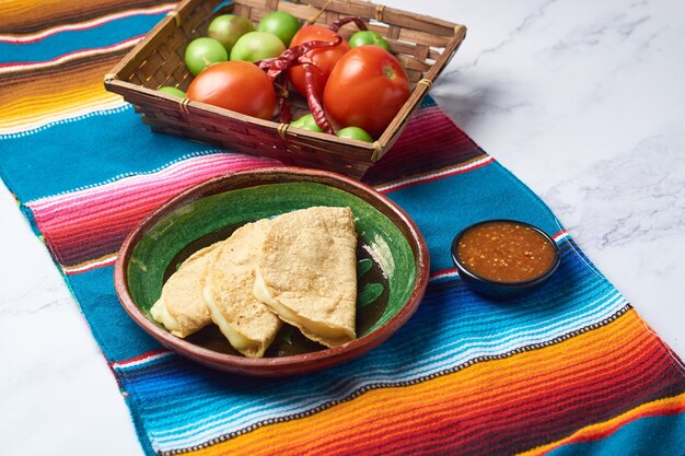 Authentic Mexican quesadillas made with corn tortillas filled with cheese