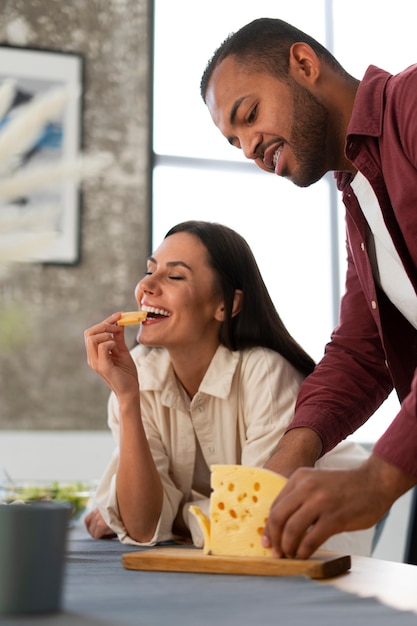 Authentic people eating fresh cheese