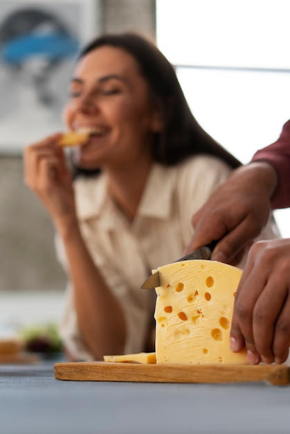 Authentic person eating fresh cheese