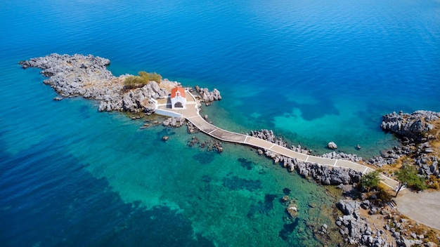 Authentic traditional greek islands- unspoiled chios, little church in the sea over the rocks agios isidoros. eastern aegean islands