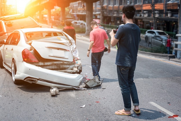 Photo auto accident involving two cars on a city street