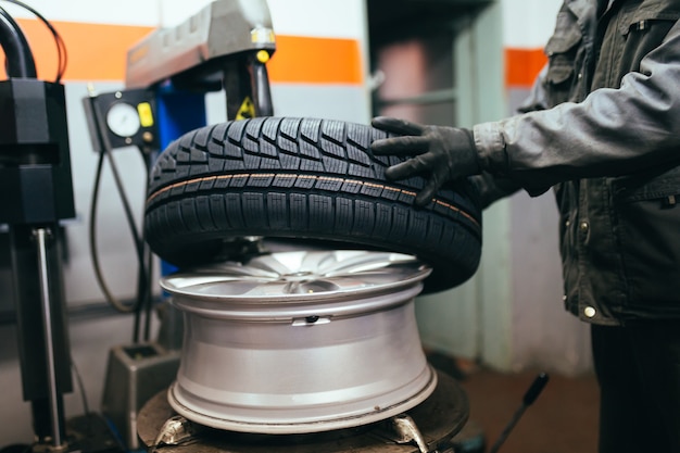 Auto mechanic store with wheels ready for putting on car