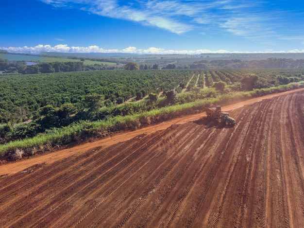 Automated tractor planting sugar cane in Brazil	- Pederneiras-Sao Paulo-Brasil - 03-20-2021.