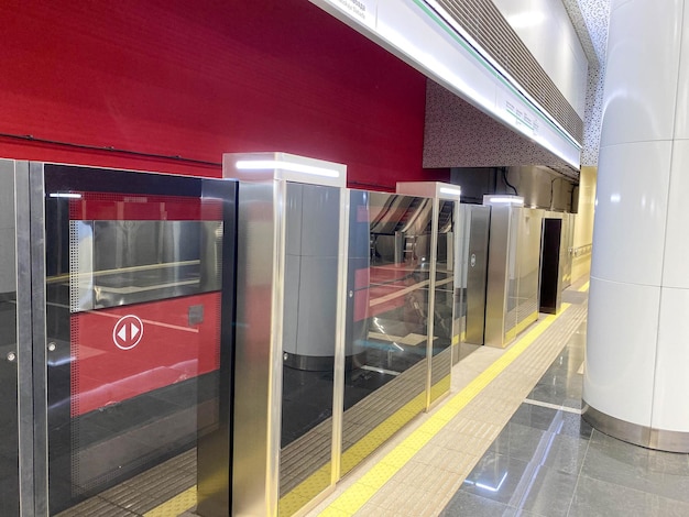 Automatic door platform system at a new modern metro station Metro security system glass beautiful