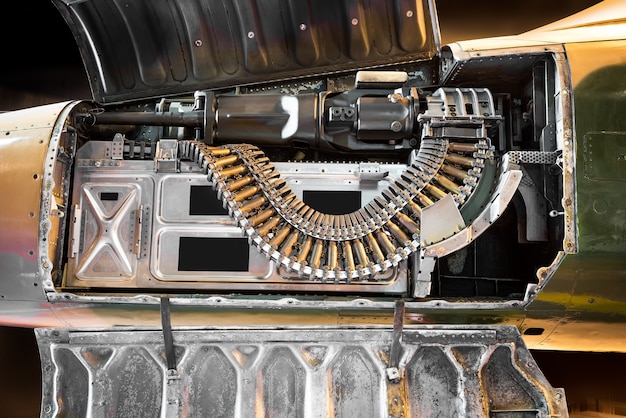 Automatic gun weapon inside ancient fighter plane