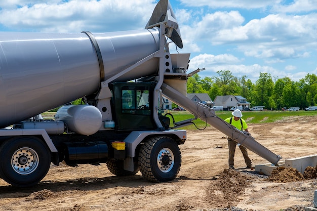 Automobile concrete mixer at the construction site