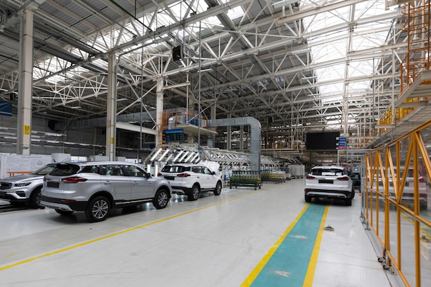 Automobile production line modern car assembly plant interior of a hightech factory manufacturing