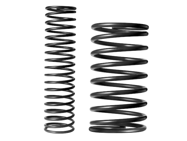 Automotive suspension springs on a white background