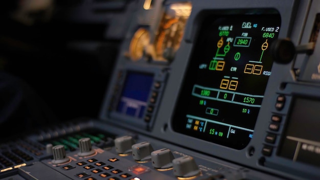autopilot control element of an airliner panel of switches on an aircraft flight deck thrust levers