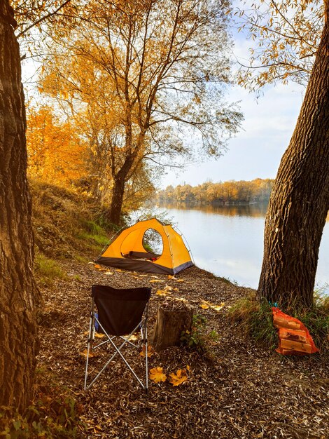 Autumn camping site near lake