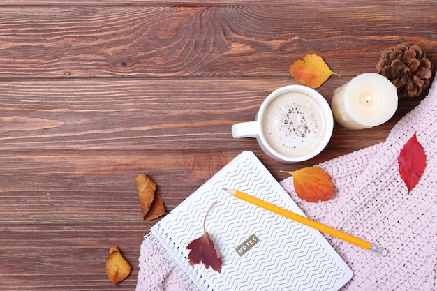 Autumn composition and autumn leaves on a light background closeup