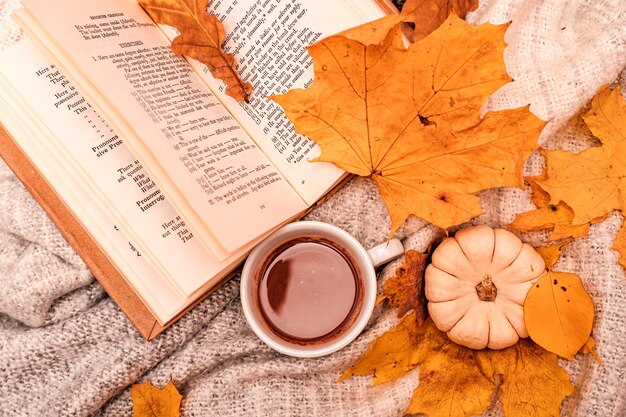 Photo autumn composition book cup of coffee pumpkin and leaves