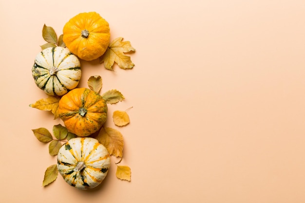 Autumn composition Pattern made of dried leaves and other design accessories on table Flat lay top view