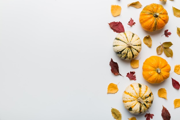 Autumn composition Pattern made of dried leaves and other design accessories on table Flat lay top view