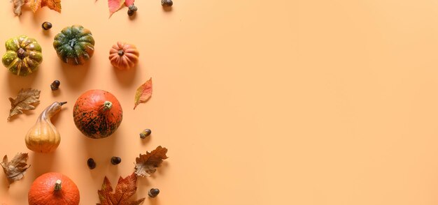 autumn composition of pumpkins colorful leaves halloween or thanksgiving day