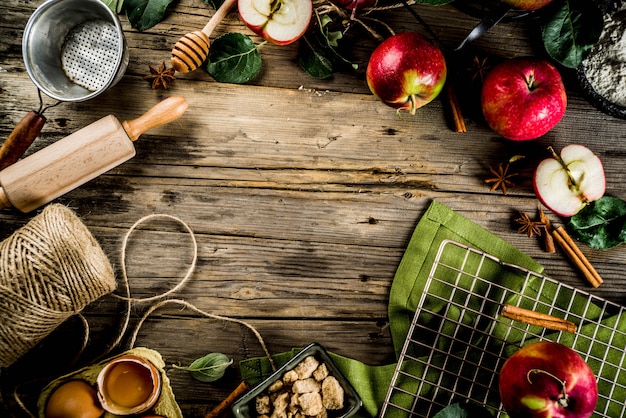 Autumn cooking background, Apple pie baking concept, fresh red apples, sweet spices, sugar, flour