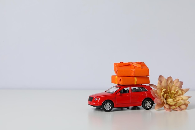 Autumn or fall travel and vacation concept with car