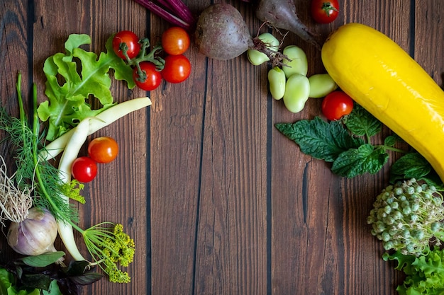 Autumn fresh vegetables on wooden table background