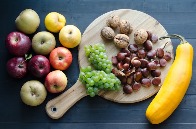 Autumn fruits on wood