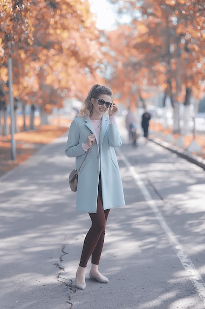 autumn girl / portrait of a girl in an autumn city park, walk happy weekend female portrait