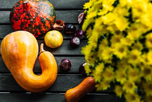 autumn harvest still life with yellow Chrysanthemum flower bunch