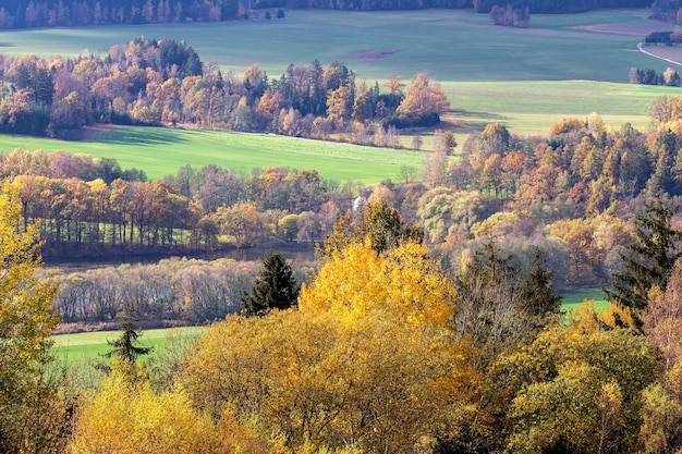 Autumn hilly landscape with meadows