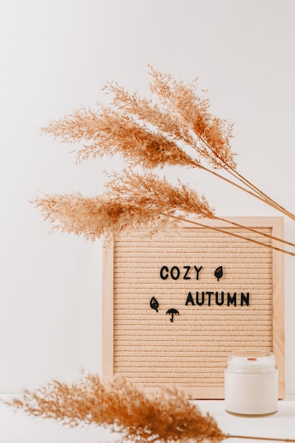 Autumn inscription on letter board Cozy autumn Hygge autumn cozy mood comfort concept