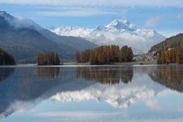 Autumn landscape of a lake in the Swiss Alps of the Engadine Val