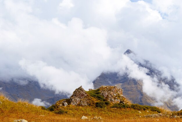 Autumn mountain landscape of the Caucasus with rocky alpine meadows