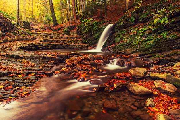 Autumn mountain waterfall