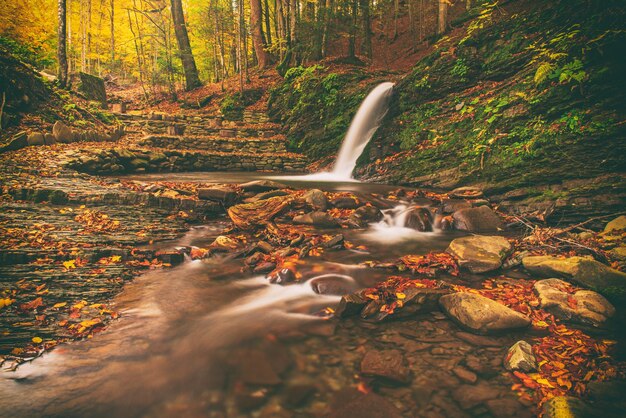 Autumn mountain waterfall