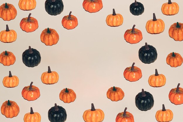 Autumn pattern of colorful pumpkins with copy space halloween minimal background holiday concept