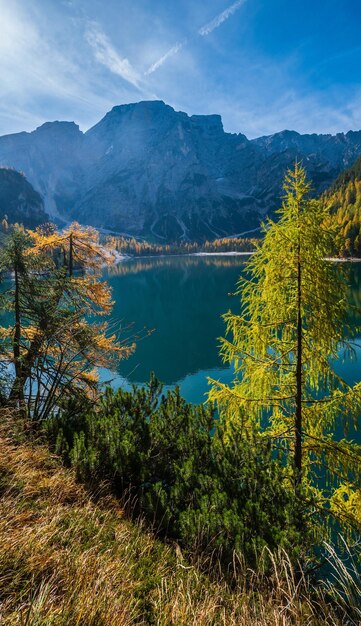 Autumn peaceful alpine lake Braies or Pragser Wildsee FanesSennesPrags national park South Tyrol Dolomites Alps Italy Europe Picturesque traveling seasonal and nature beauty concept scene