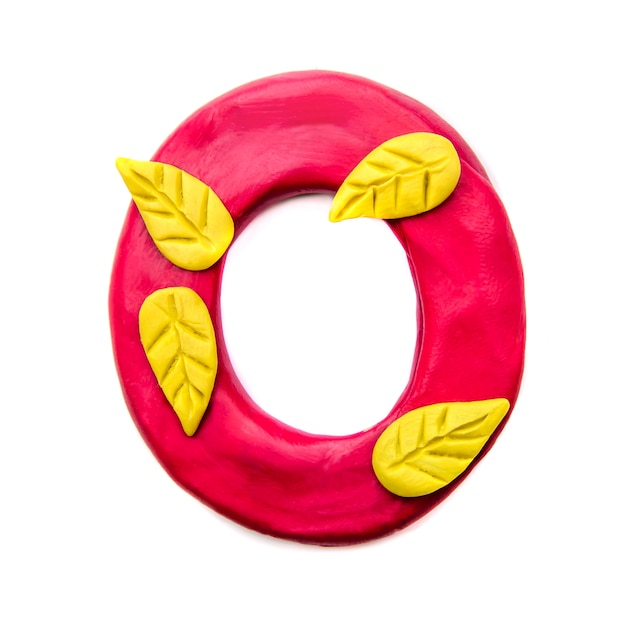 Photo autumn plasticine letter o of the english alphabet