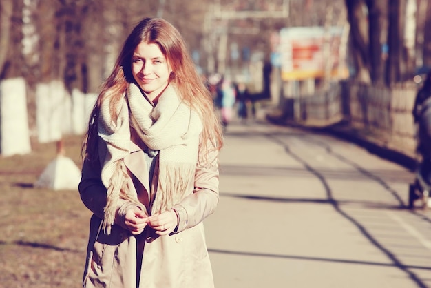 Autumn portrait of a girl in a coat