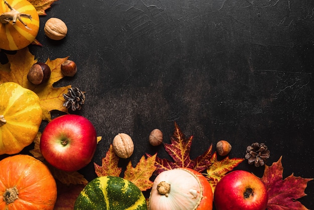 Autumn pumpkins, leaves, squash, berries and nuts