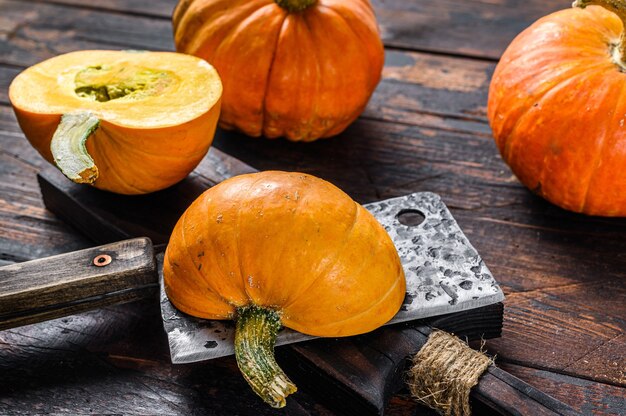 Autumn Pumpkins on a wooden table top view