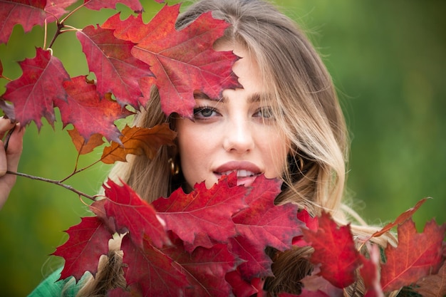 Autumn romance woman with leaves female model on foliage day dream and lifestyle beauty outdoor