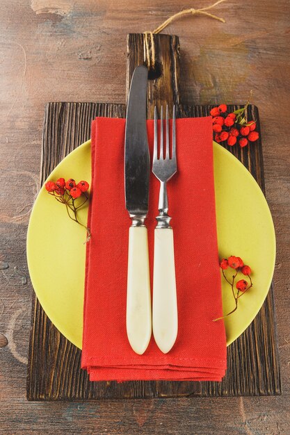 Autumn rustic table setting with berries. Top view