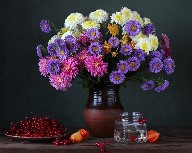 Autumn still life with chrysanthemums and asters.