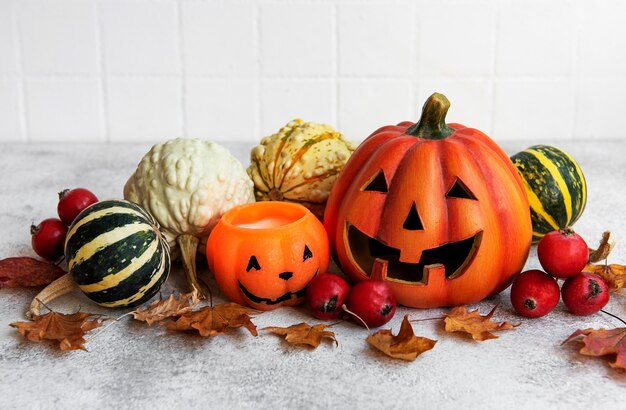 Autumn still life with Halloween pumpkins on the table