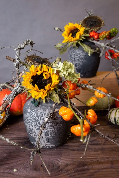 Autumn still life with pumpkins and flowers